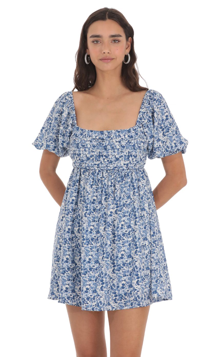 Picture Floral Puff Sleeve Dress in Blue. Source: https://media-img.lucyinthesky.com/data/May24/850xAUTO/c4c2016f-c276-4b40-aa98-2927d4d8f92e.jpg