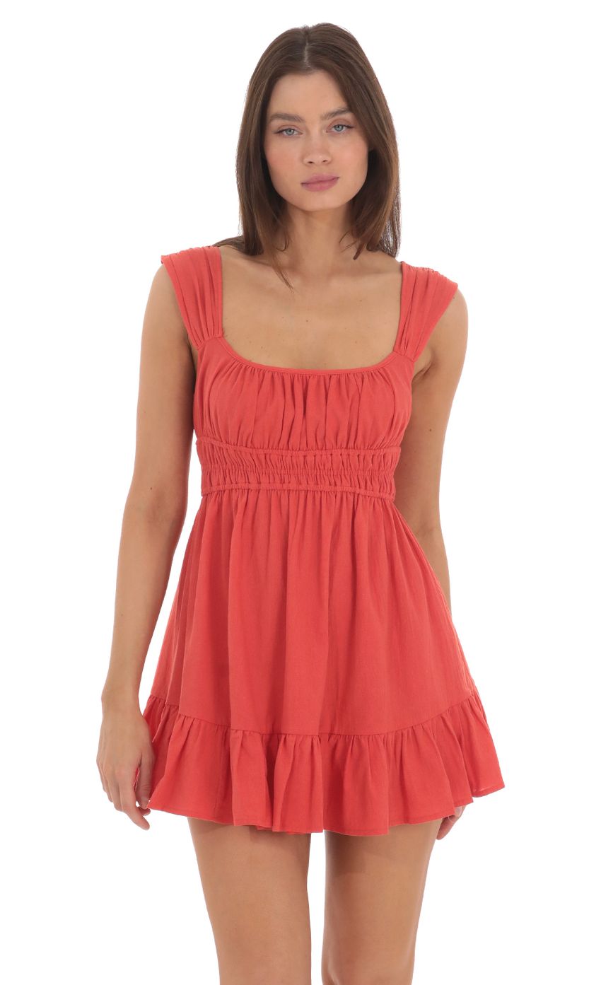 Picture Ruched Babydoll Dress in Blood Orange. Source: https://media-img.lucyinthesky.com/data/May24/850xAUTO/c50d7406-a6d2-4296-8eca-b190bde89449.jpg