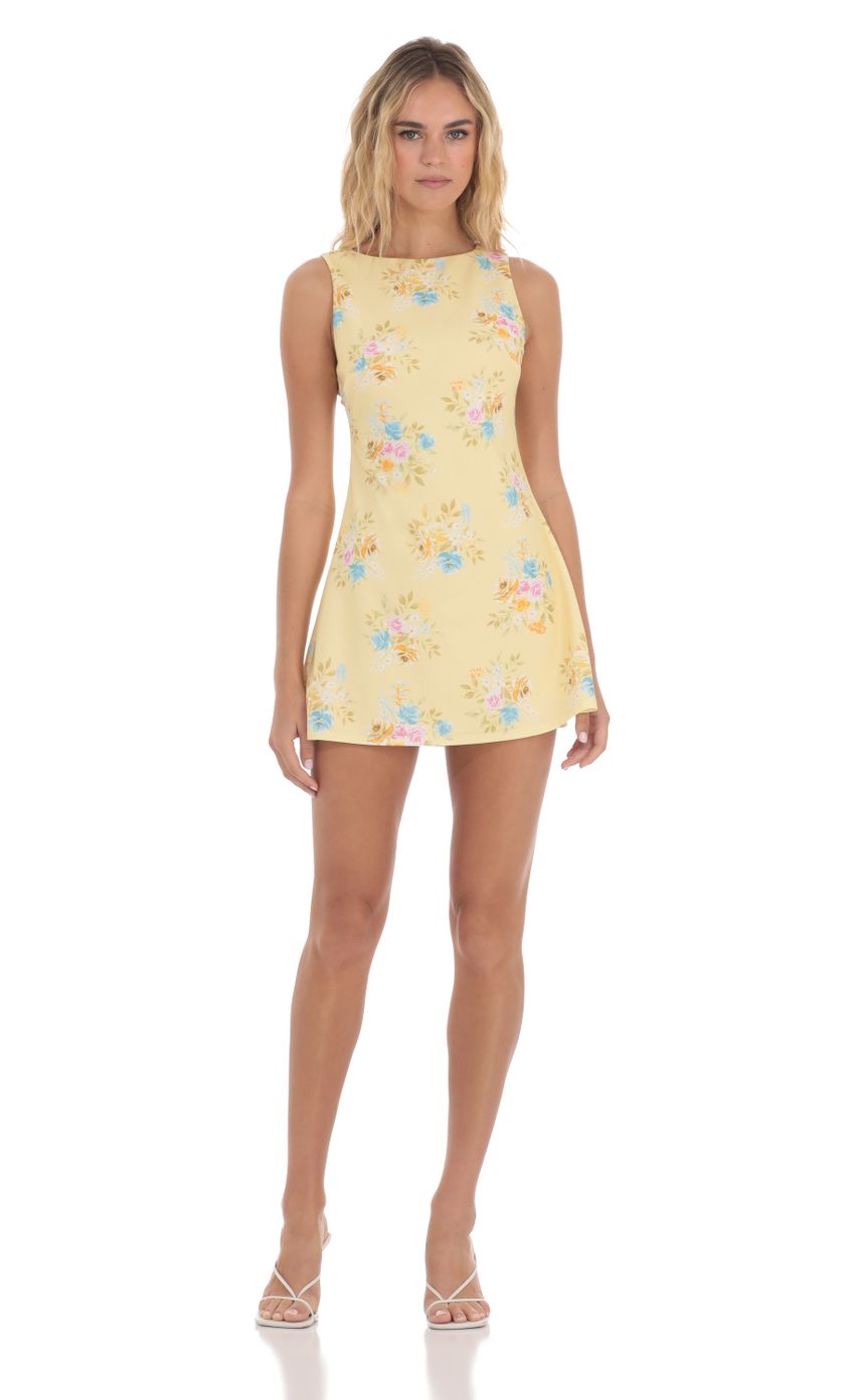 Picture Floral High Neck Dress in Yellow. Source: https://media-img.lucyinthesky.com/data/May24/850xAUTO/c7864758-6eae-4a36-8cc3-7757f45fa6b2.jpg