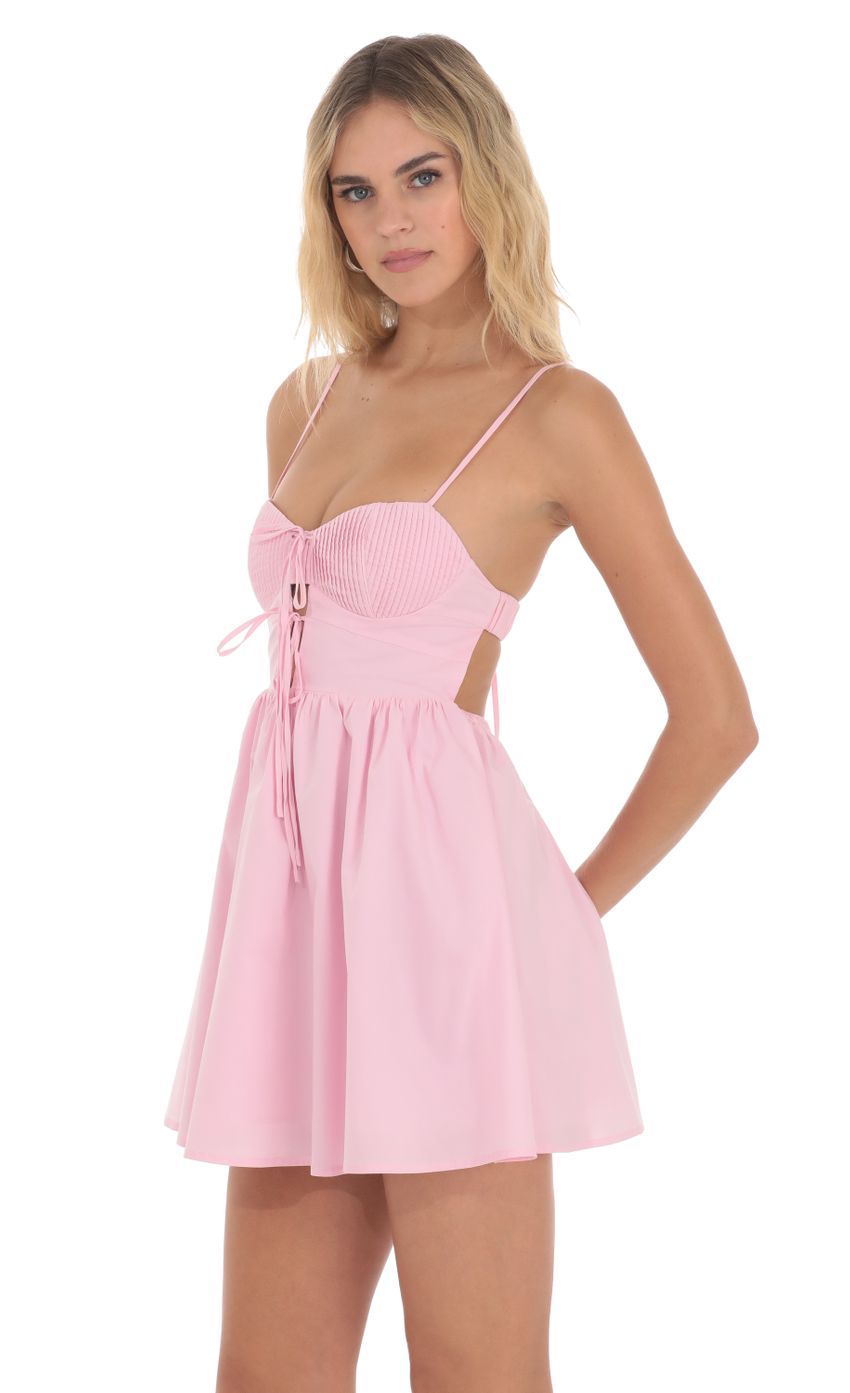 Picture Front Ties A-line Dress in Pink. Source: https://media-img.lucyinthesky.com/data/May24/850xAUTO/cc80f7bd-0f26-4110-908f-fc41bbfc250e.jpg