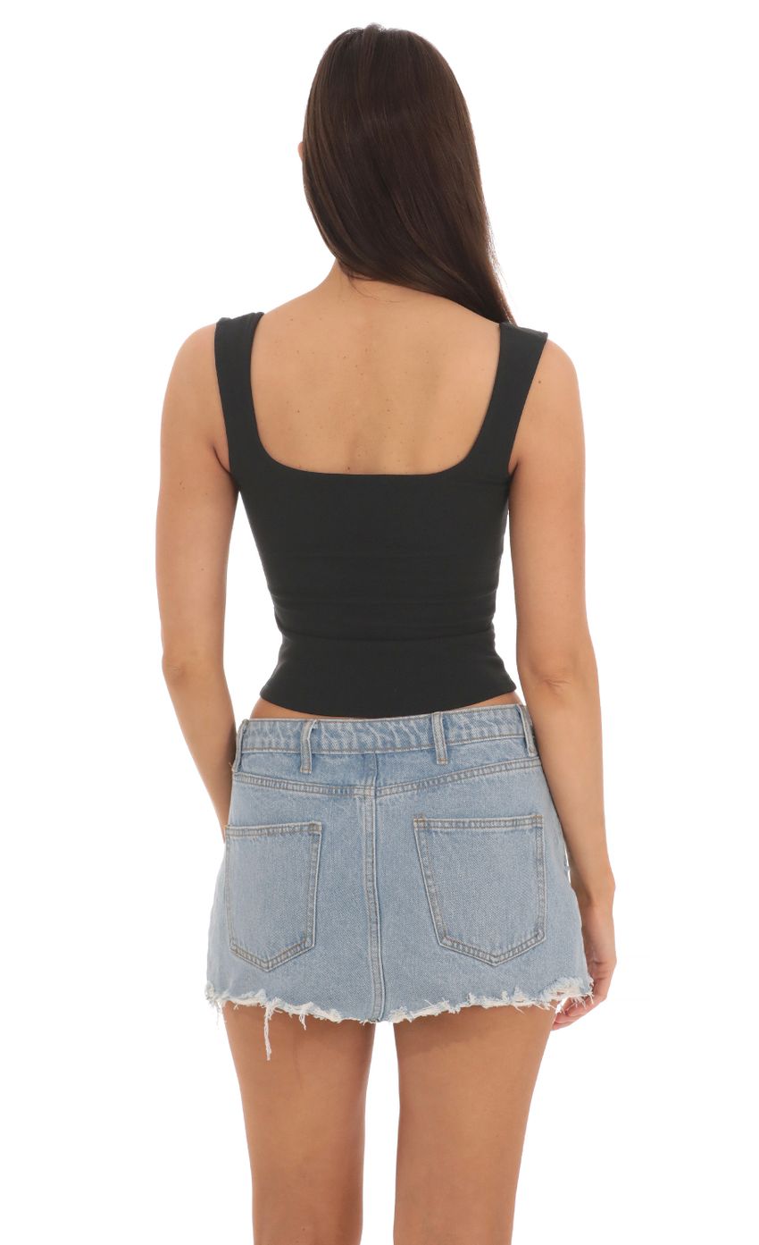 Picture Scoop Tank Top in Black. Source: https://media-img.lucyinthesky.com/data/May24/850xAUTO/d079fa69-60e1-4528-9ca4-377ef6f2278a.jpg