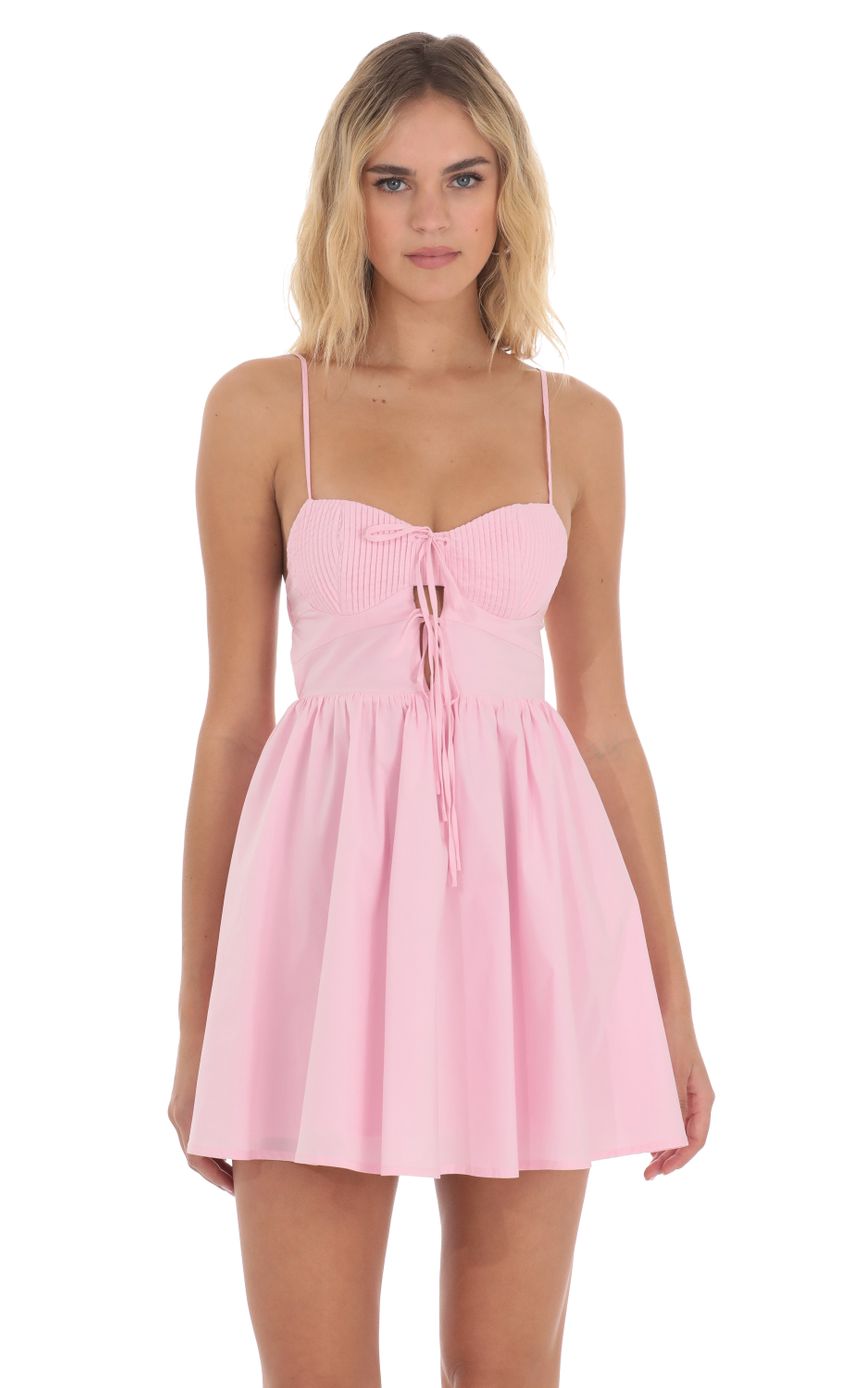 Picture Front Ties A-line Dress in Pink. Source: https://media-img.lucyinthesky.com/data/May24/850xAUTO/d5924d23-f64a-4fc8-a560-e2919a466cbe.jpg