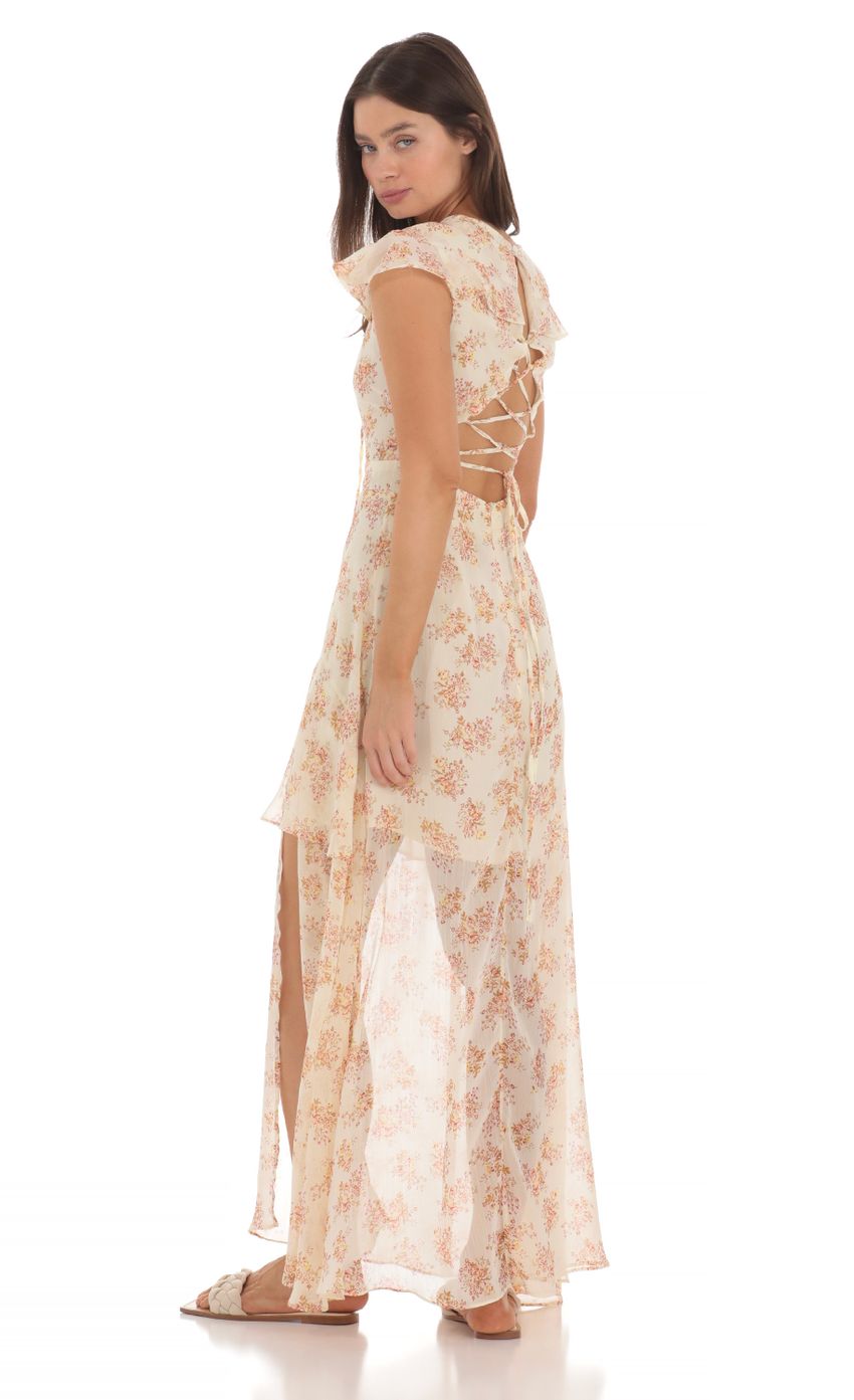 Picture Floral Shimmer Ruffle Dress in Yellow. Source: https://media-img.lucyinthesky.com/data/May24/850xAUTO/d675e637-9325-4595-ba22-4faf78ec3d34.jpg