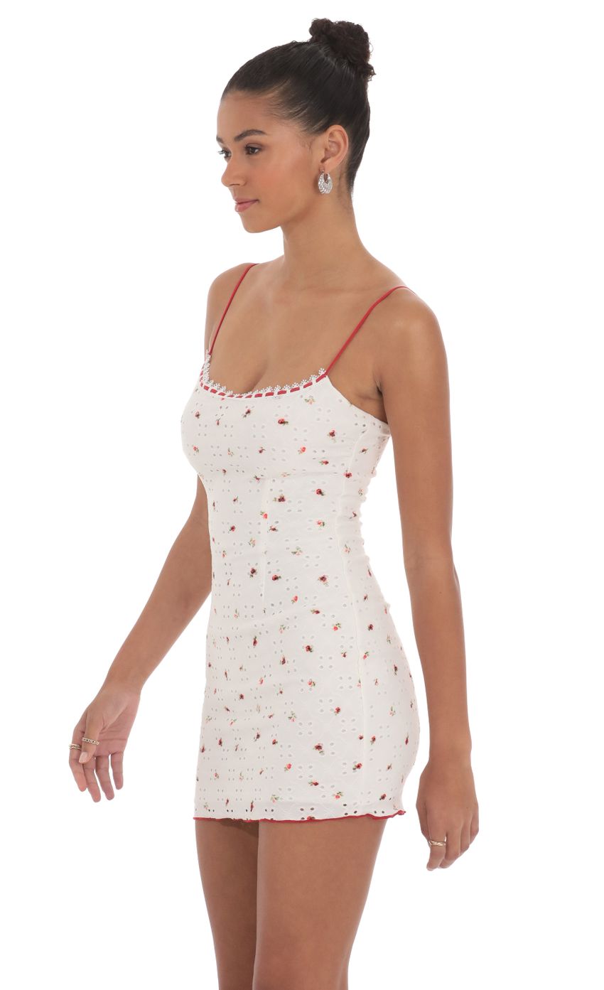 Picture Eyelet Floral Bodycon Dress in White. Source: https://media-img.lucyinthesky.com/data/May24/850xAUTO/d7f3b388-e93f-4fe4-9775-9eb9b0fe4b58.jpg