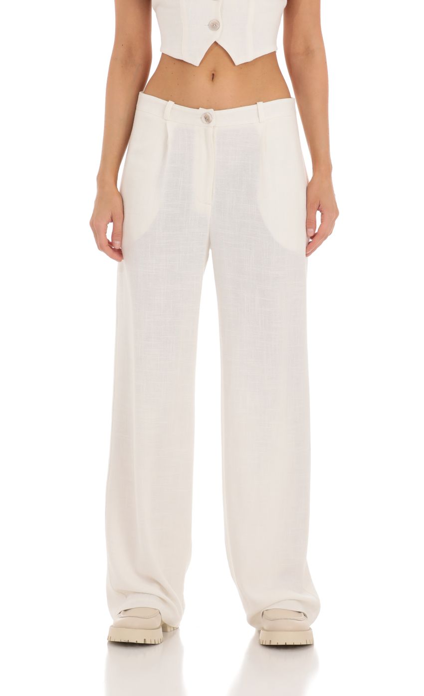 Picture Wide Leg Linen Pants in Ivory. Source: https://media-img.lucyinthesky.com/data/May24/850xAUTO/dbb90b3b-80e1-4120-a4fe-0fe7fdfda39c.jpg