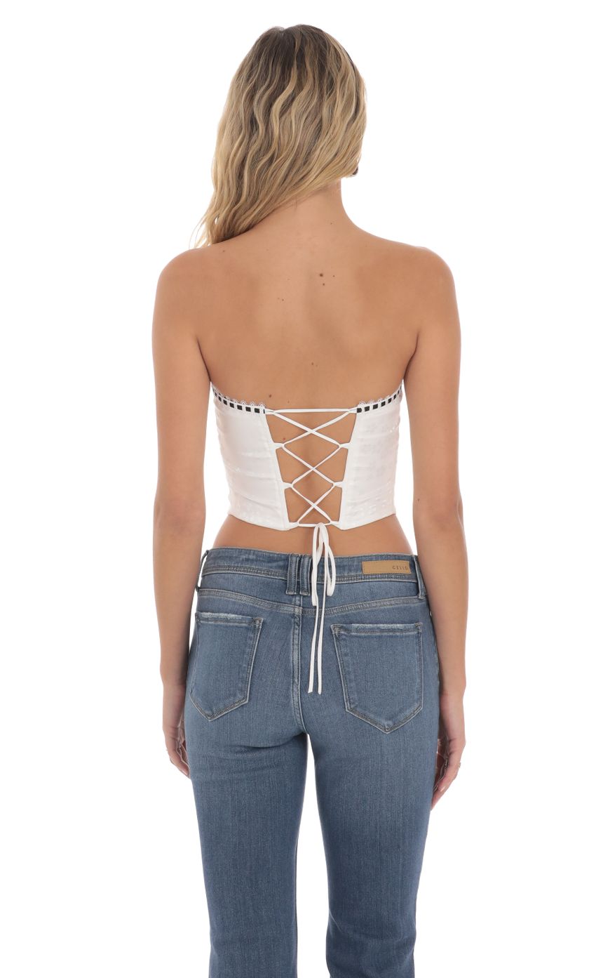 Picture Strapless Jaqcuard Top in White. Source: https://media-img.lucyinthesky.com/data/May24/850xAUTO/e17f1b99-c180-4d0d-bedd-dbc6099b6ecd.jpg