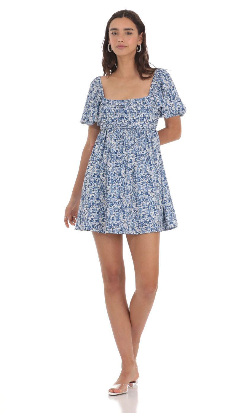 Picture Floral Puff Sleeve Dress in Blue. Source: https://media-img.lucyinthesky.com/data/May24/850xAUTO/e4422aae-7e70-494d-9f9a-d14b354df062.jpg