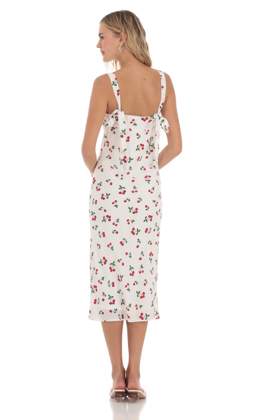 Picture Cherry Back Ties Midi Dress in White. Source: https://media-img.lucyinthesky.com/data/May24/850xAUTO/ef6cbe17-062b-4cef-8371-3a8825f3ada1.jpg