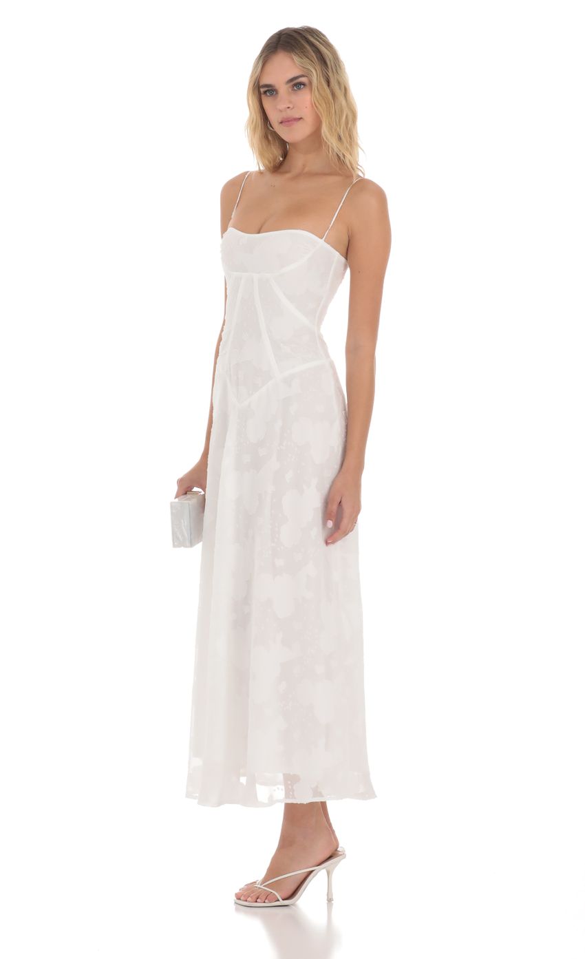 Picture Textured Floral Maxi Dress in White. Source: https://media-img.lucyinthesky.com/data/May24/850xAUTO/f030b810-08e8-4c09-8883-36c9390f61f4.jpg
