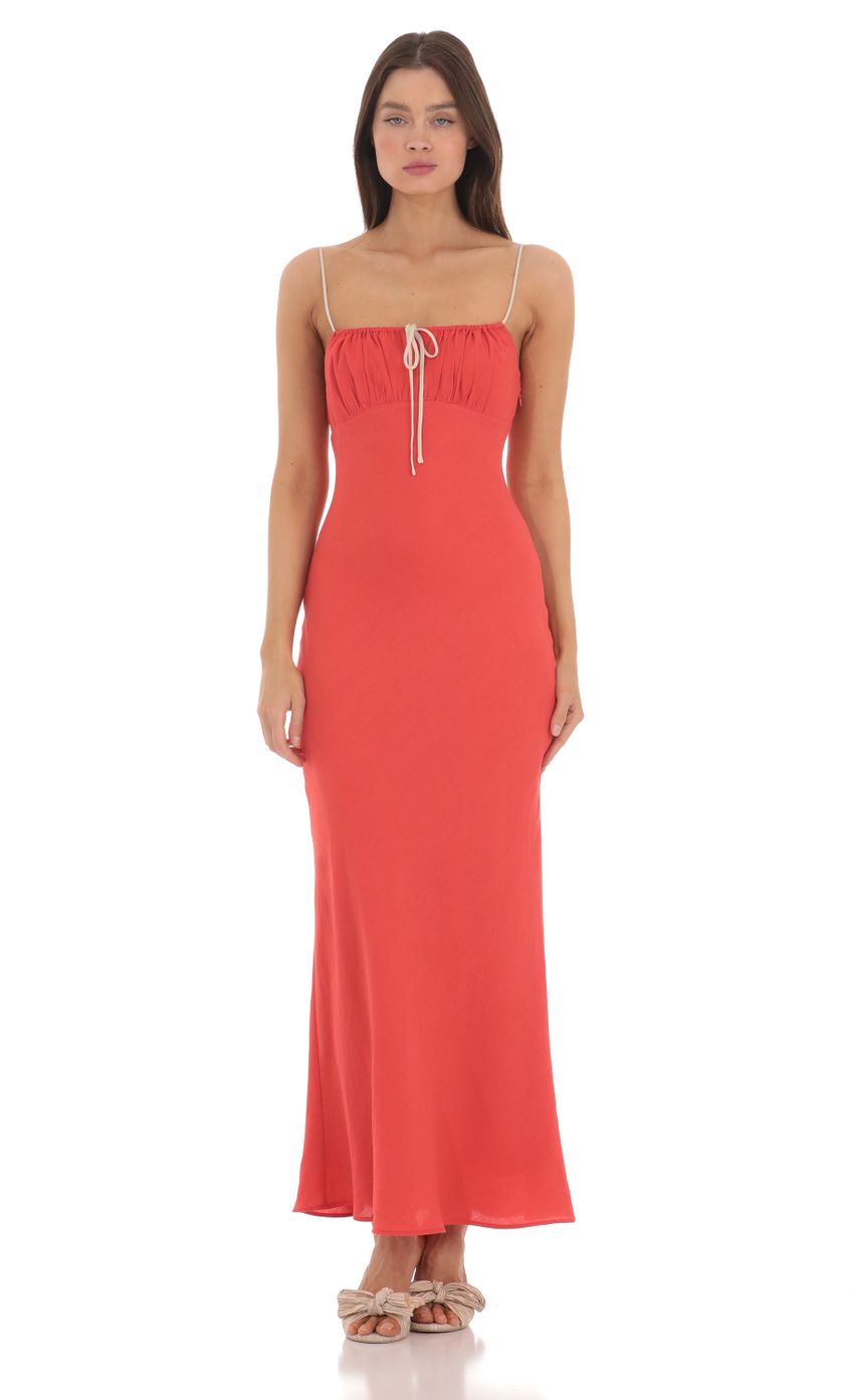 Picture Front Tie Maxi Dress in Coral Red. Source: https://media-img.lucyinthesky.com/data/May24/850xAUTO/f2ac5c26-41fa-4f23-90c4-1949dc861ed6.jpg