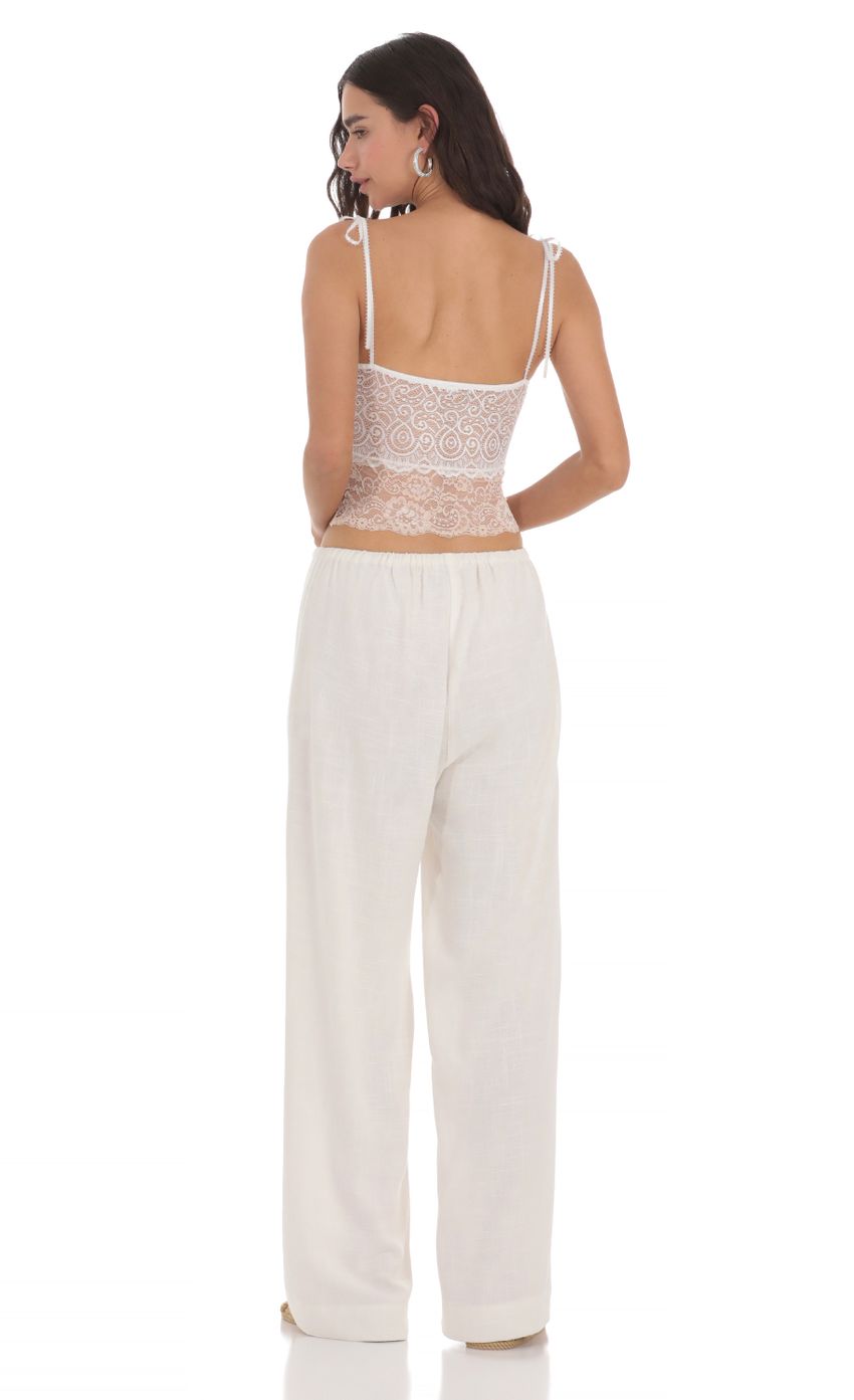 Picture Linen Drawstring Pants in Cream. Source: https://media-img.lucyinthesky.com/data/May24/850xAUTO/f3bde0bd-b1ce-444b-aea3-55b5b372b67f.jpg