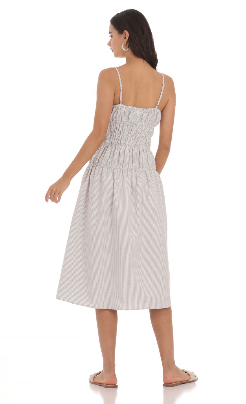 Picture Ruched Striped Midi Dress in Grey. Source: https://media-img.lucyinthesky.com/data/May24/850xAUTO/f56977f3-c5b5-4dce-be51-d7ee3c1ed041.jpg