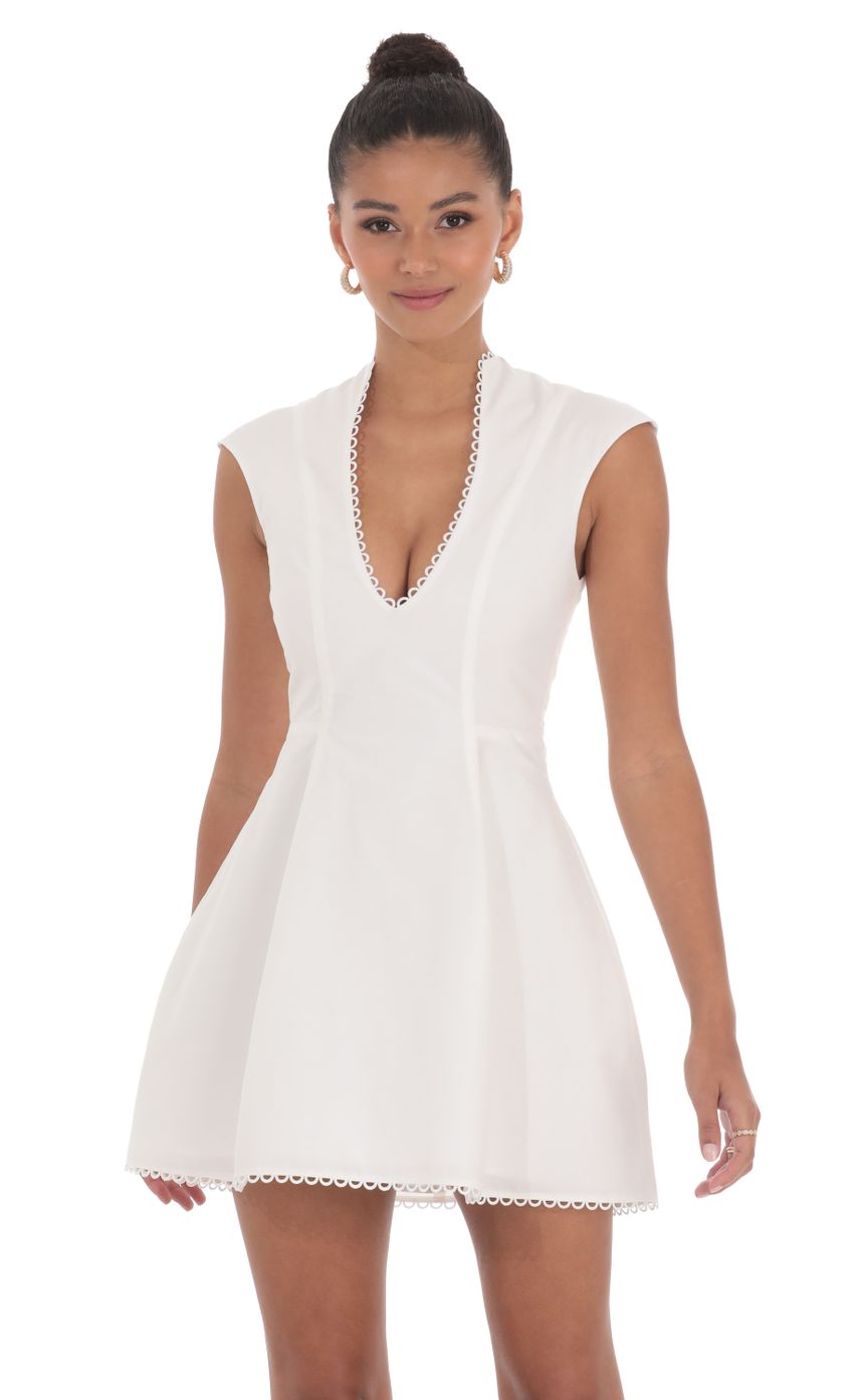 Picture Plunge V-Neck Dress in White. Source: https://media-img.lucyinthesky.com/data/May24/850xAUTO/f6975486-e052-4b8f-8971-0d94f318e3f6.jpg