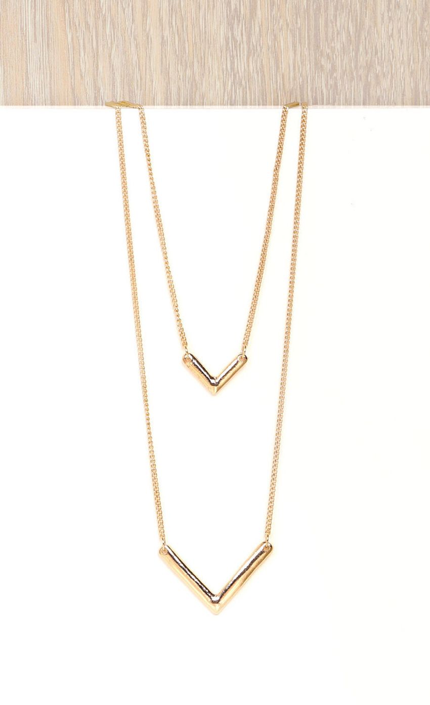 Picture ONE DIRECTION NECKLACE IN GOLD. Source: https://media-img.lucyinthesky.com/data/Nov14_2/850xAUTO/0Y5A1798.JPG