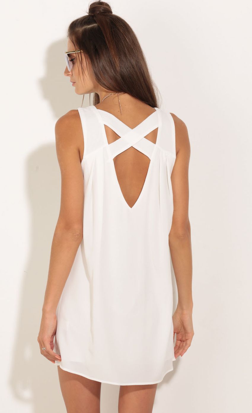 Picture Cross-Back Shift Dress In White. Source: https://media-img.lucyinthesky.com/data/Nov15_1/850xAUTO/0Y5A8102.JPG