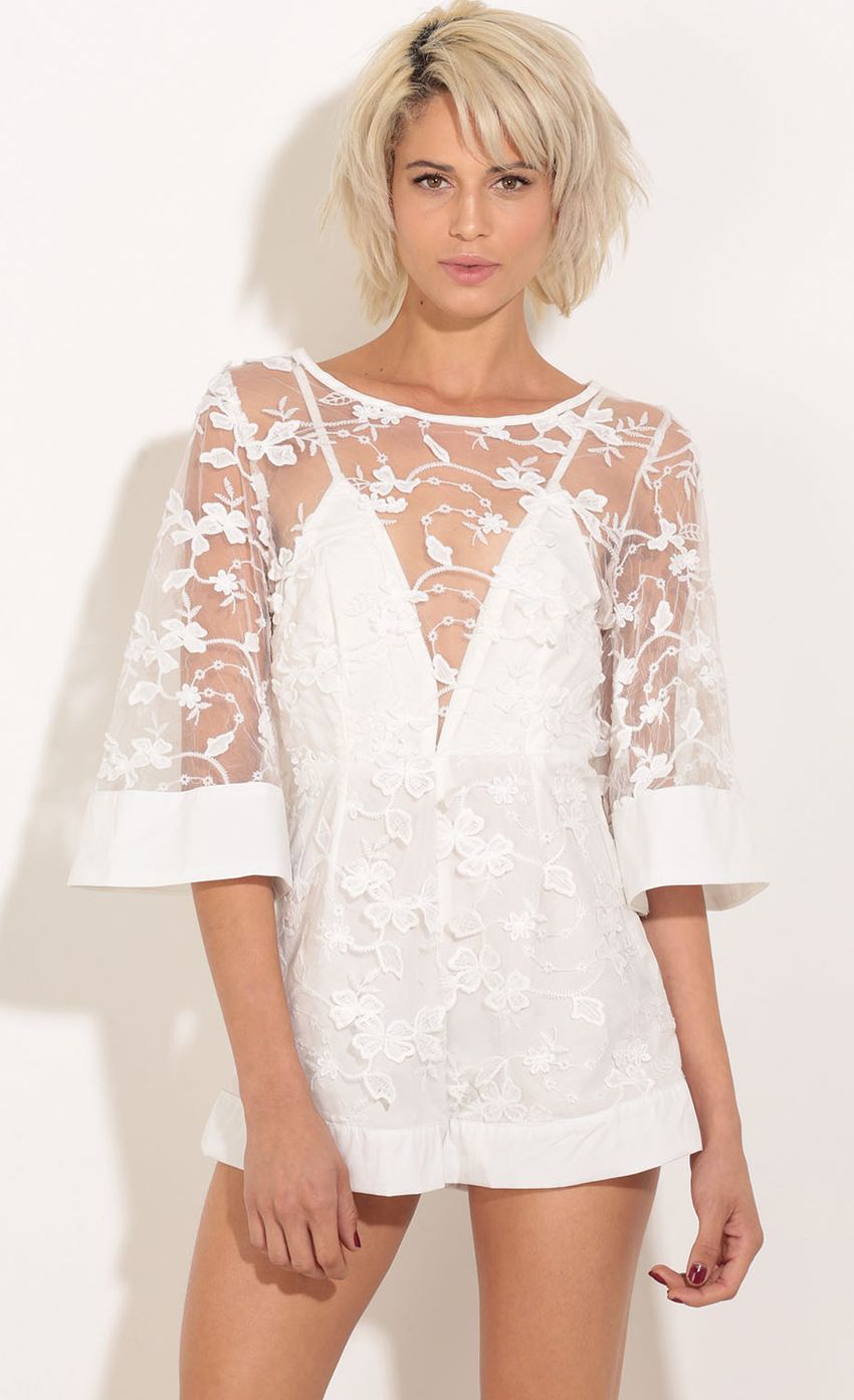 Picture Sheer Floral Lace Playsuit In White. Source: https://media-img.lucyinthesky.com/data/Nov15_1/850xAUTO/0Y5A9365.JPG