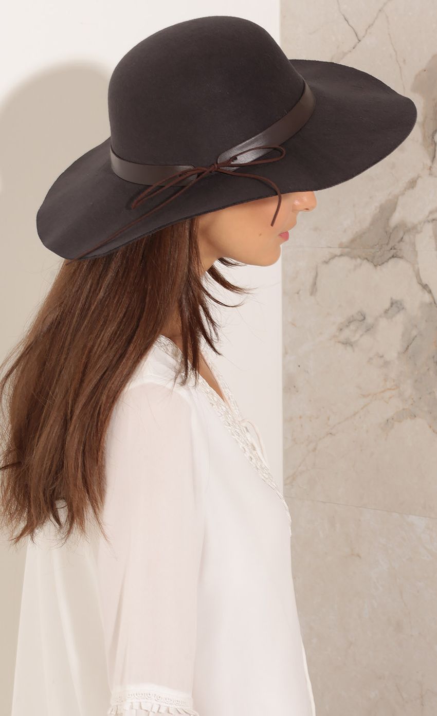 Picture Leather Lace-Up Wide Brim Floppy Hat. Source: https://media-img.lucyinthesky.com/data/Nov15_2/850xAUTO/0Y5A5802.JPG