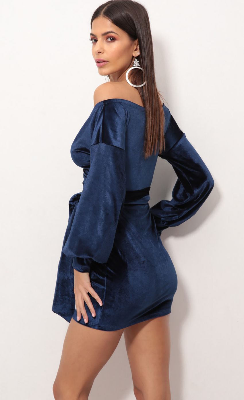 Picture Off The Shoulder Velvet Dress in Navy. Source: https://media-img.lucyinthesky.com/data/Nov18_1/850xAUTO/0Y5A8595.JPG