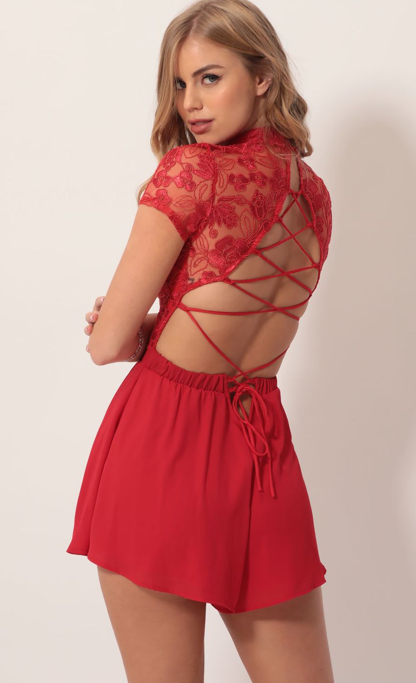 Picture Heiress Floral Lace Romper in Red. Source: https://media-img.lucyinthesky.com/data/Nov19_2/850xAUTO/781A4619.JPG