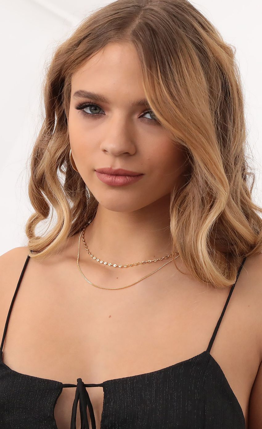 Picture Dainty Layering Necklaces in Gold. Source: https://media-img.lucyinthesky.com/data/Nov20_1/850xAUTO/1V9A1976.JPG