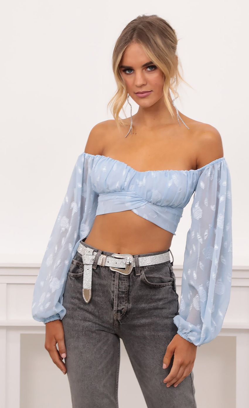 Picture Floral Off The Shoulder Top in Blue. Source: https://media-img.lucyinthesky.com/data/Nov20_1/850xAUTO/1V9A3432.JPG