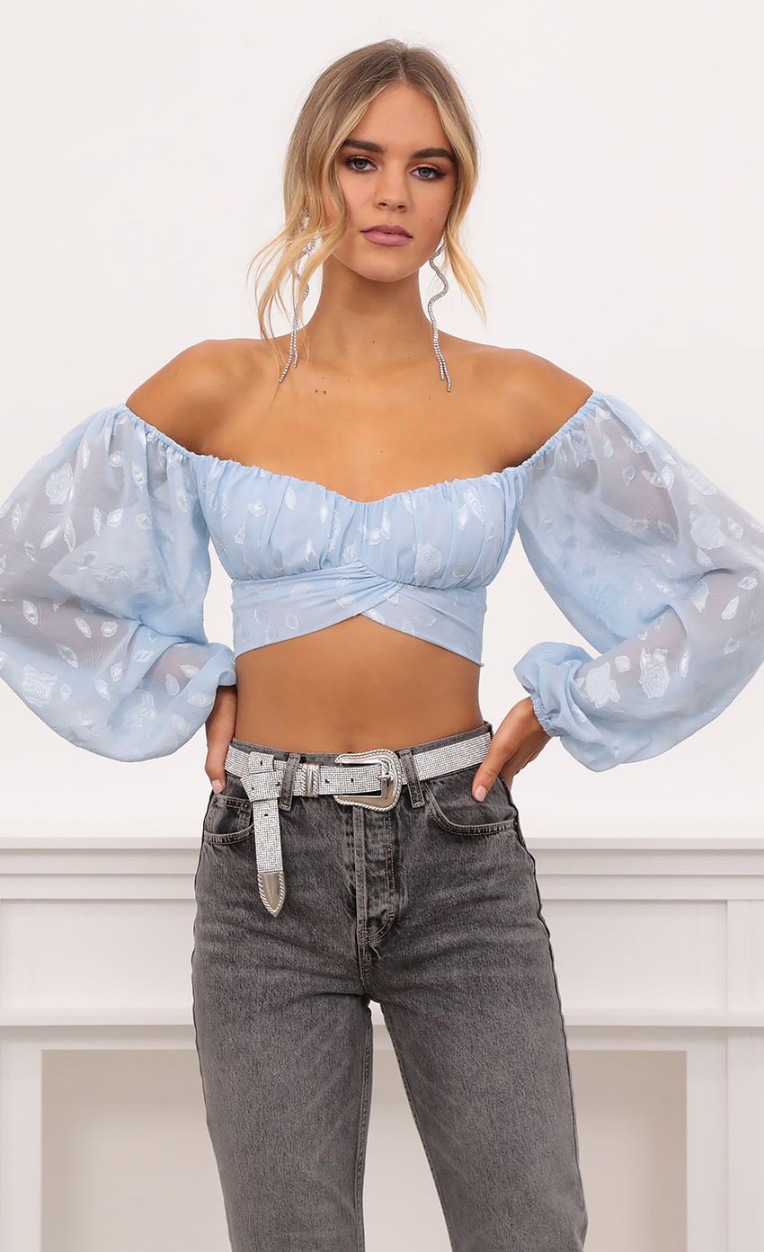 Picture Floral Off The Shoulder Top in Blue. Source: https://media-img.lucyinthesky.com/data/Nov20_1/850xAUTO/1V9A3452.JPG