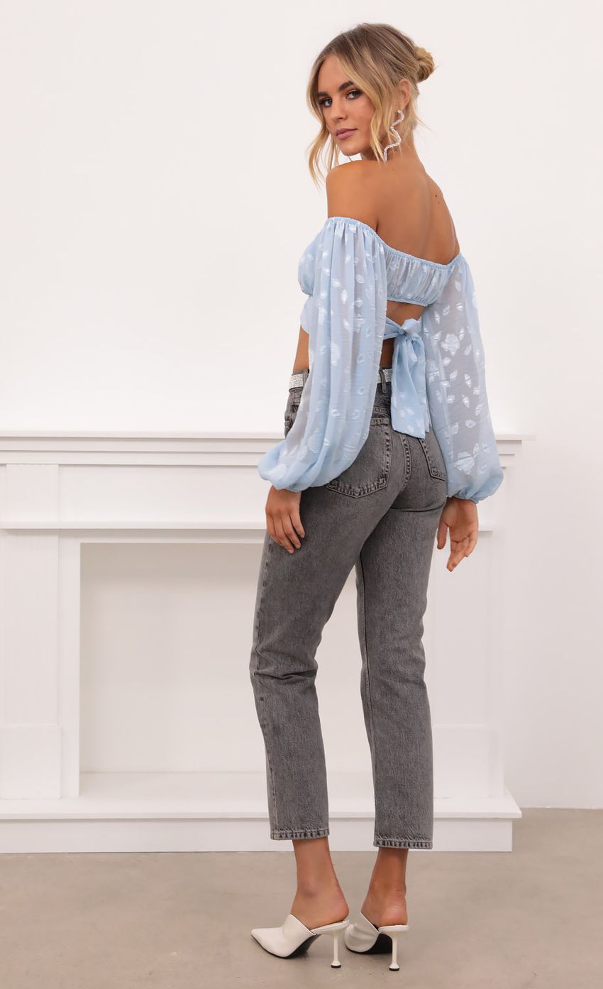 Picture Floral Off The Shoulder Top in Blue. Source: https://media-img.lucyinthesky.com/data/Nov20_1/850xAUTO/1V9A3493.JPG
