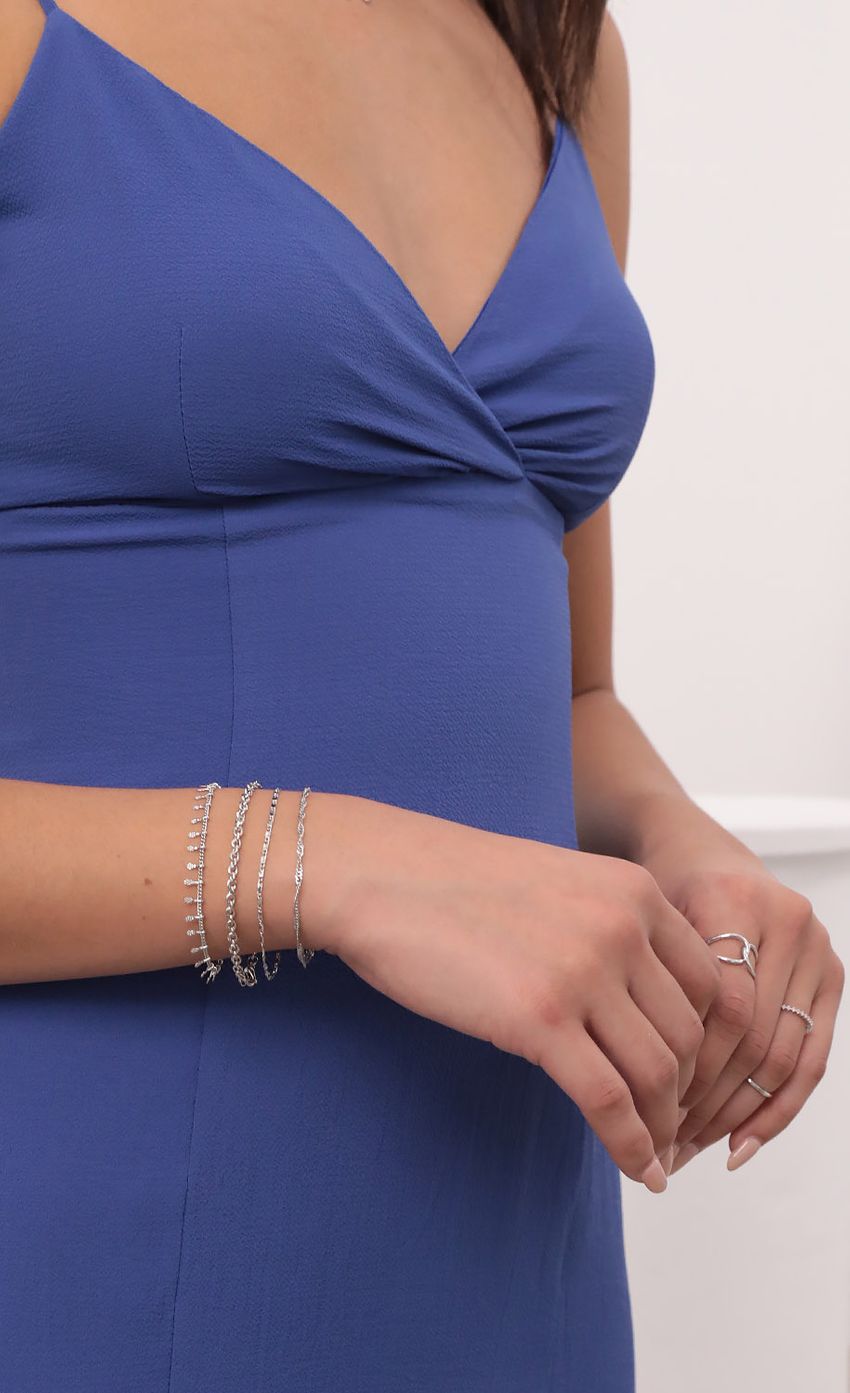 Picture Layering Bracelets in Silver. Source: https://media-img.lucyinthesky.com/data/Nov20_2/850xAUTO/1V9A5618.JPG