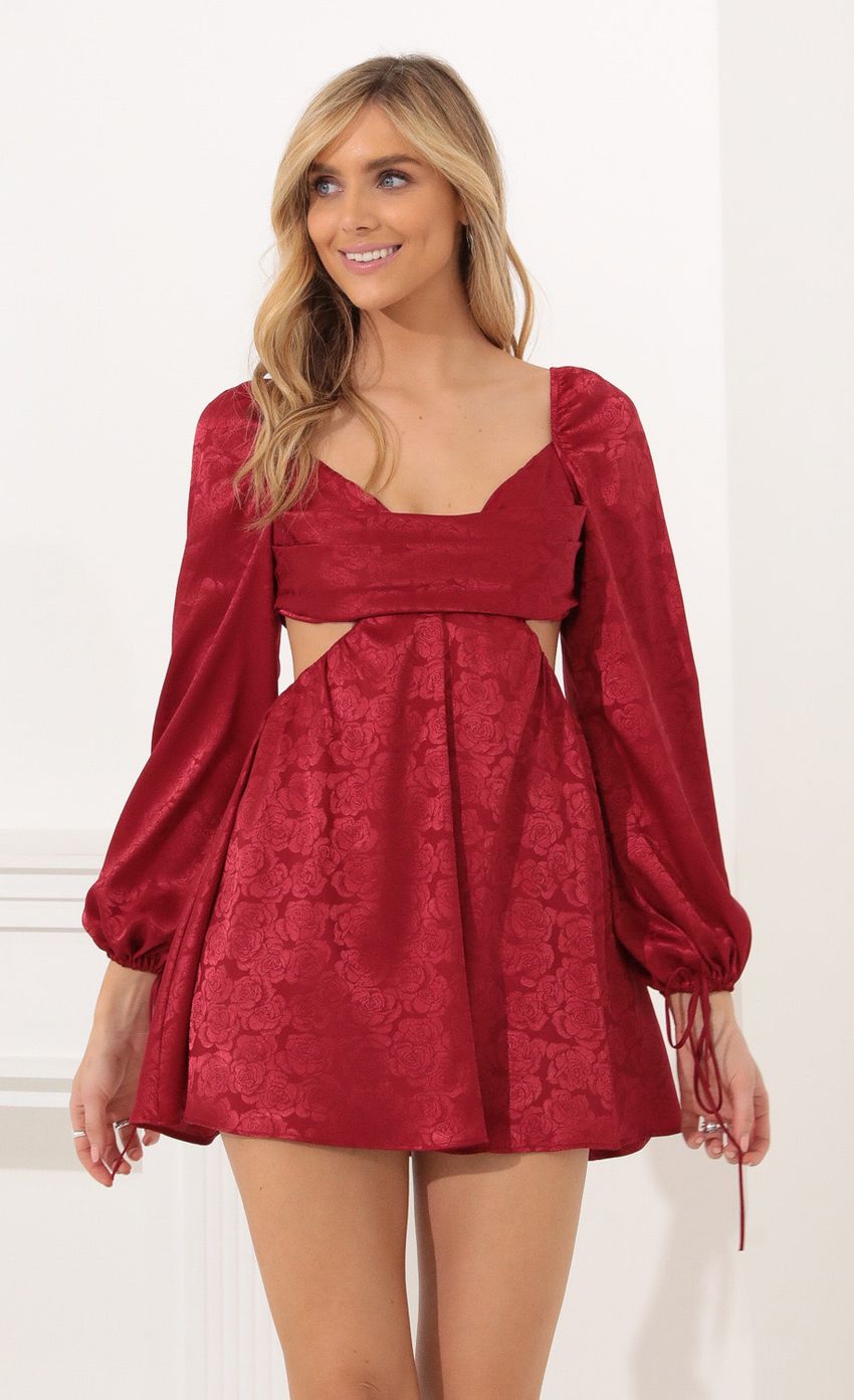 Picture Krista Long Sleeve Fit and Flare Dress in Red Floral Satin. Source: https://media-img.lucyinthesky.com/data/Nov21_1/850xAUTO/1V9A0028.JPG