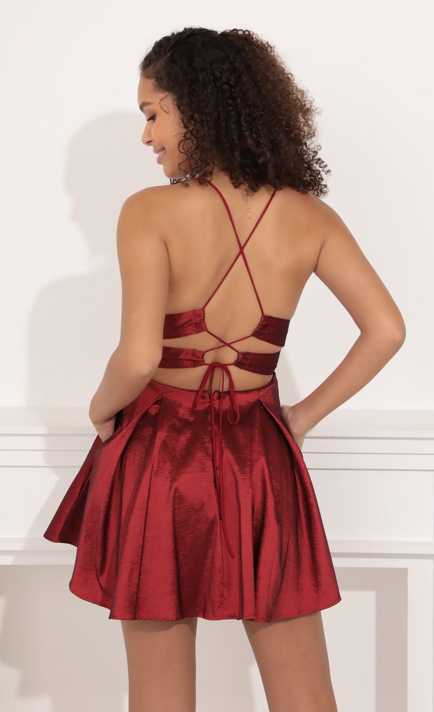 Picture Fit and Flare Dress in Burgundy. Source: https://media-img.lucyinthesky.com/data/Nov21_1/850xAUTO/1V9A2617.JPG