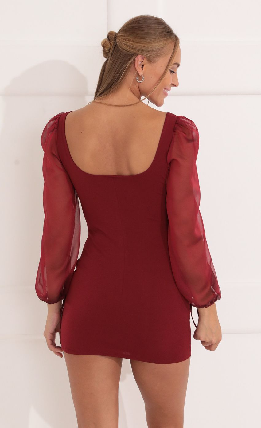 Picture Long Sleeve Cutout Dress in Burgundy. Source: https://media-img.lucyinthesky.com/data/Nov21_1/850xAUTO/1V9A6625.JPG