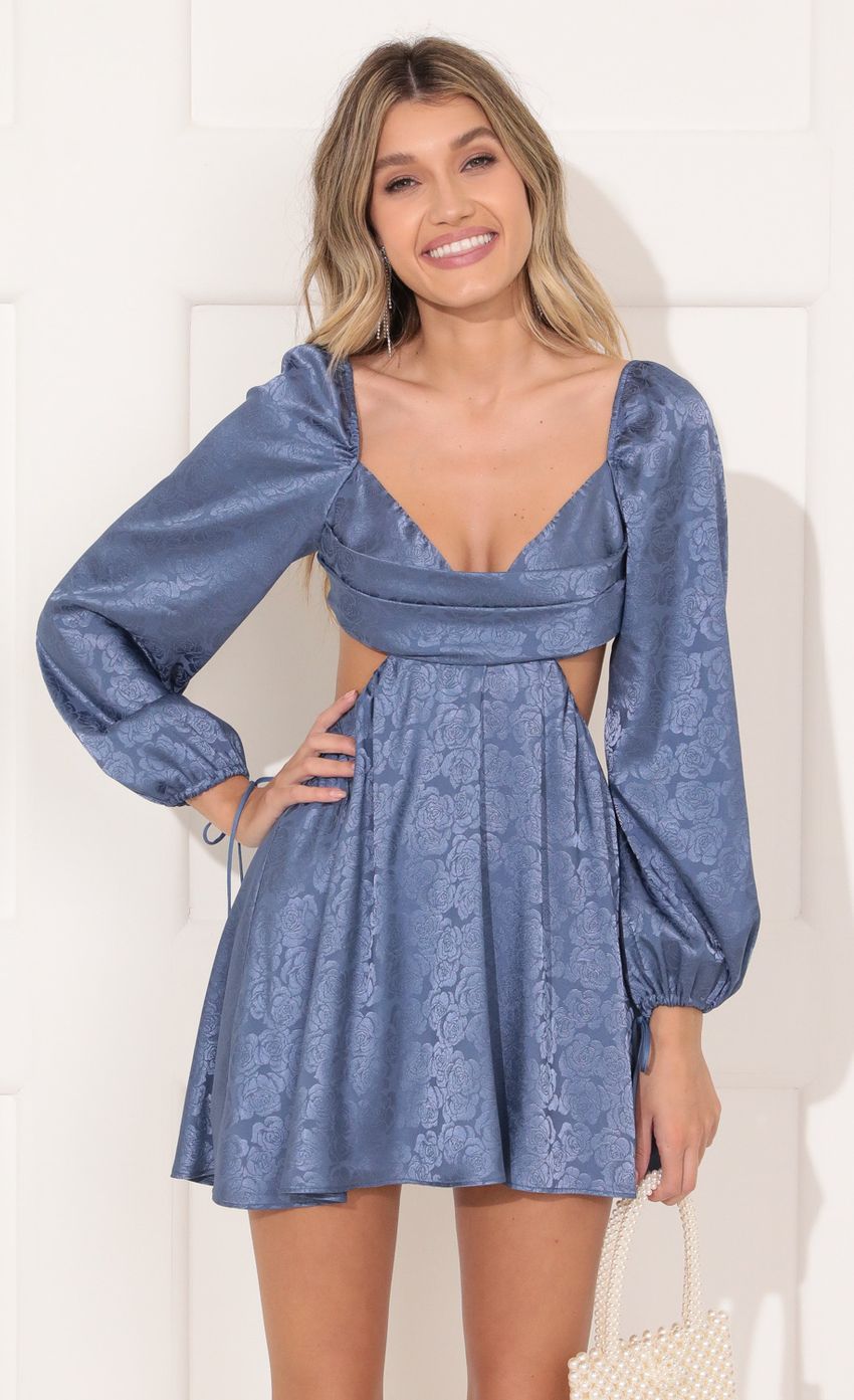 Picture Krista Long Sleeve Fit and Flare Dress in Blue Floral Satin. Source: https://media-img.lucyinthesky.com/data/Nov21_1/850xAUTO/1V9A9403.JPG