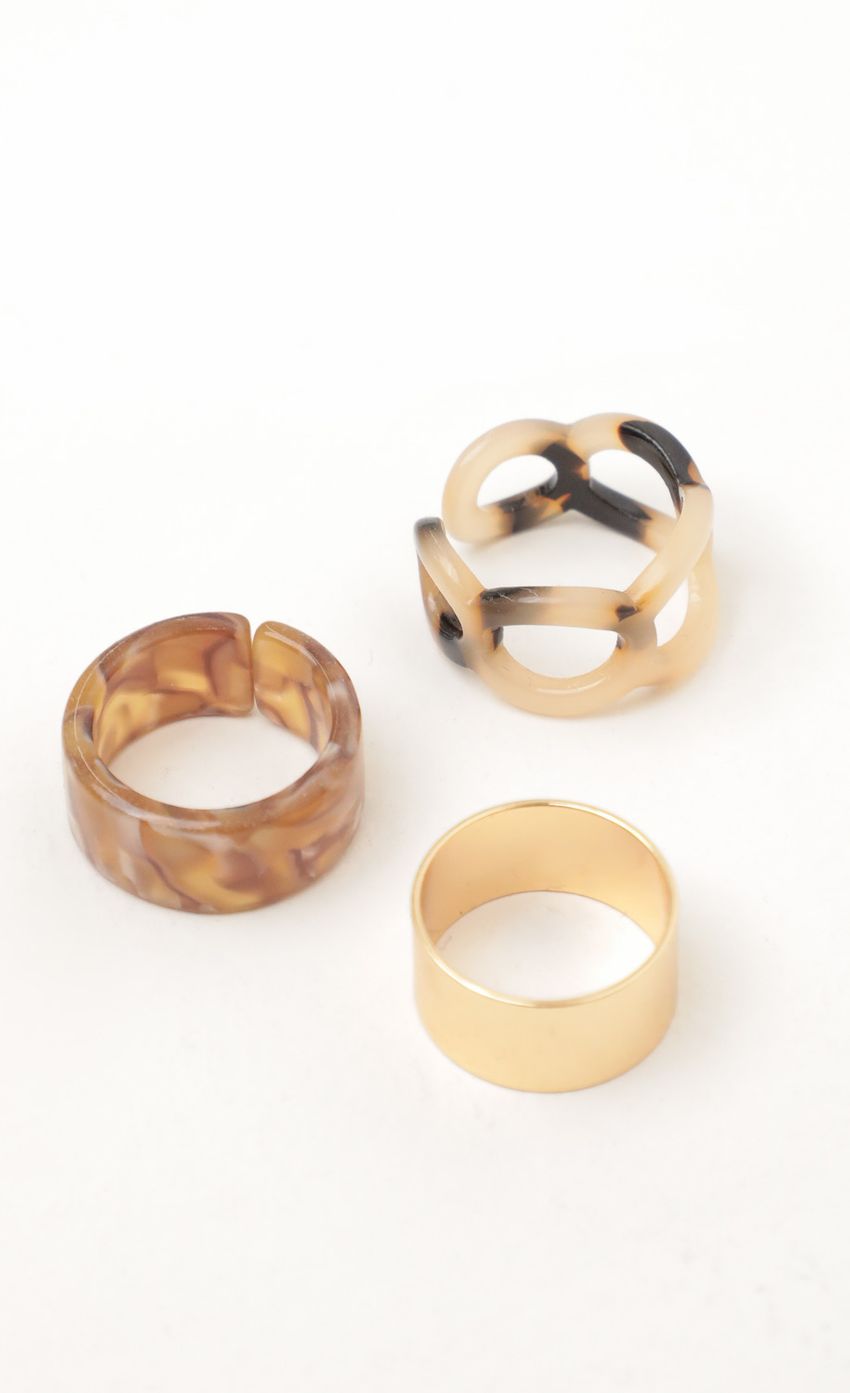 Picture Hello Baby Ring Set in Brown and Gold. Source: https://media-img.lucyinthesky.com/data/Nov21_2/850xAUTO/1J7A0170-3.JPG