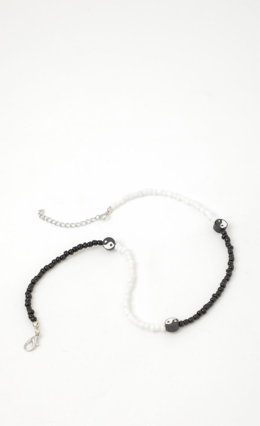 Picture Half Of Me Beaded Necklace in Black and White. Source: https://media-img.lucyinthesky.com/data/Nov21_2/850xAUTO/1J7A0957-2.JPG