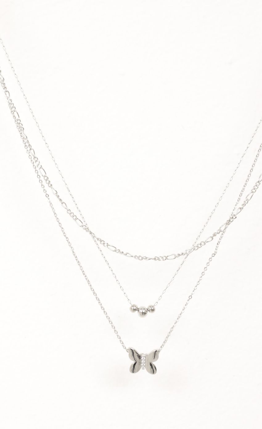 Picture She's A Diva Butterfly Necklace in Silver. Source: https://media-img.lucyinthesky.com/data/Nov21_2/850xAUTO/1J7A1053-EDIT.JPG