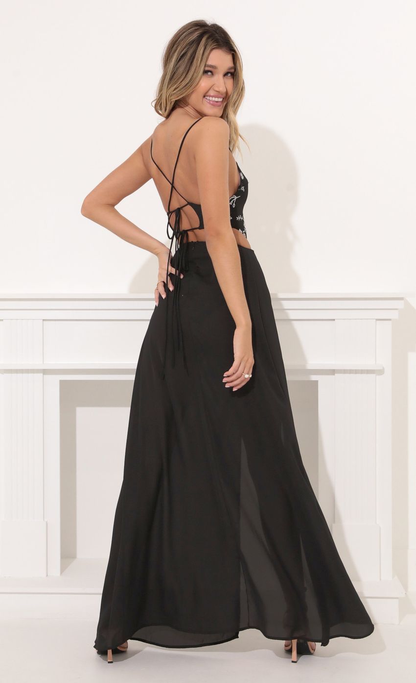 Picture Silver Sequin Lace Maxi Dress in Black. Source: https://media-img.lucyinthesky.com/data/Nov21_2/850xAUTO/1V9A5341.JPG