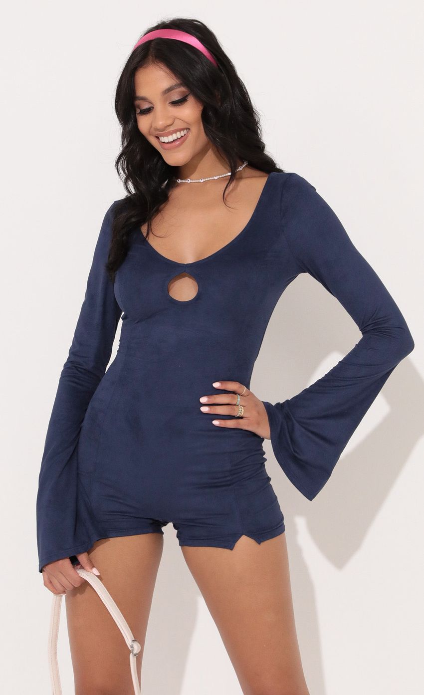 Picture Belle Sleeve Suede Romper in Navy. Source: https://media-img.lucyinthesky.com/data/Nov21_2/850xAUTO/1V9A7523.JPG