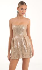 Picture Sequin Corset Dress in Gold. Source: https://media-img.lucyinthesky.com/data/Nov22/150xAUTO/62f00193-0d8f-4221-b922-b11e38c7963d.jpg