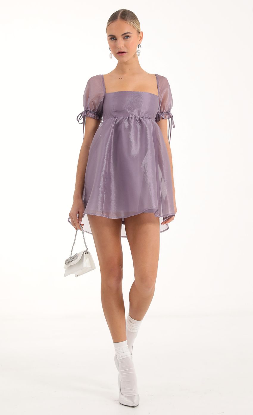 Picture Baby Doll Dress in Purple. Source: https://media-img.lucyinthesky.com/data/Nov22/850xAUTO/130f1afe-6adc-4961-8ff4-9893b4bd528b.jpg