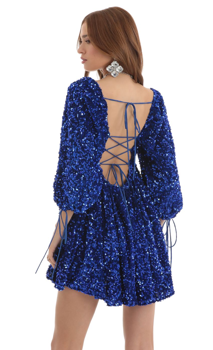 Picture Velvet Sequin Baby Doll Dress in Blue. Source: https://media-img.lucyinthesky.com/data/Nov22/850xAUTO/1f2e2f99-1fcc-4bf1-b8d0-ef2d2a601feb.jpg