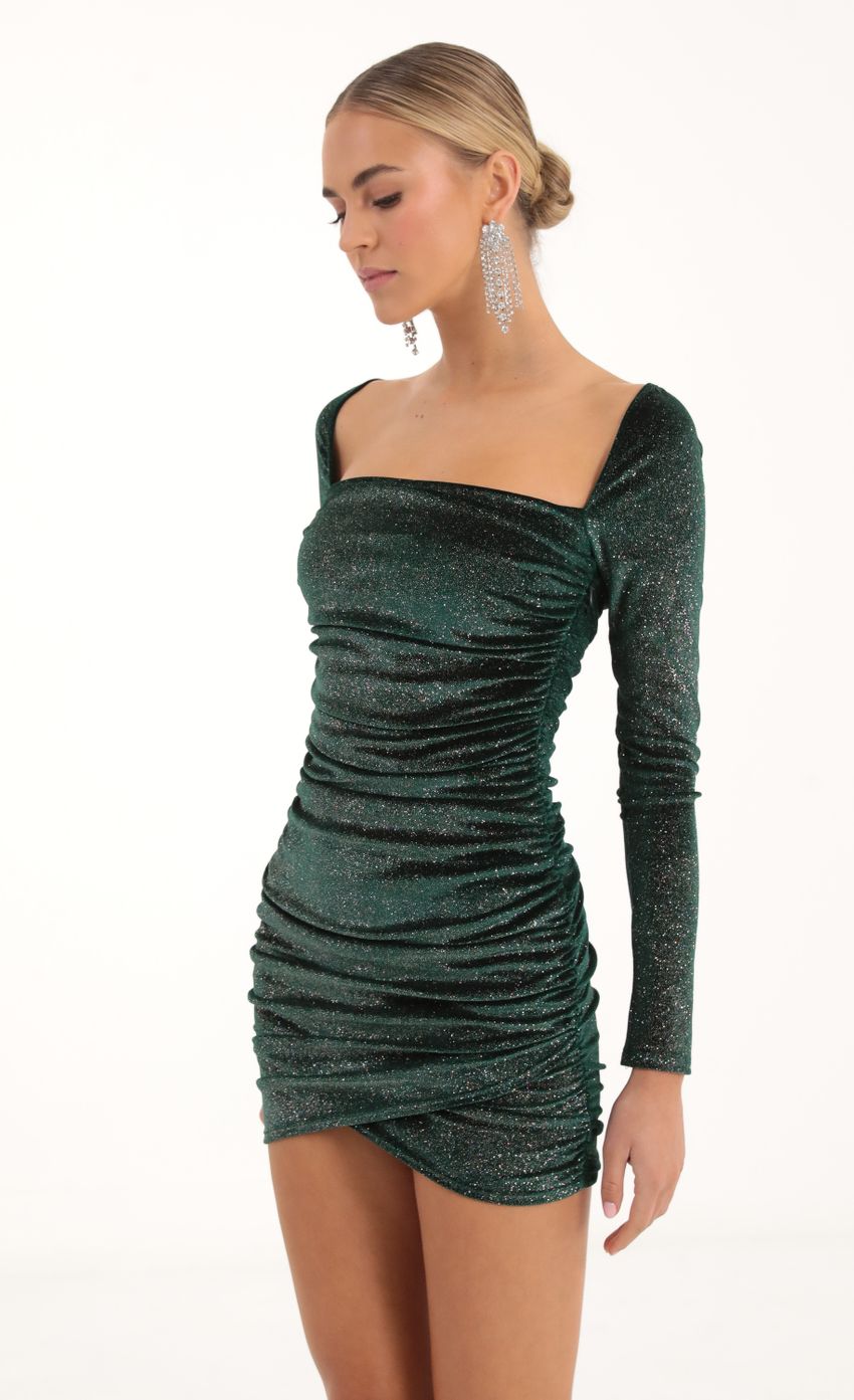 Picture Velvet Glitter Long Sleeve Bodycon Dress in Green. Source: https://media-img.lucyinthesky.com/data/Nov22/850xAUTO/290d0bcc-05de-4a43-b3ca-ee3f2dac3639.jpg