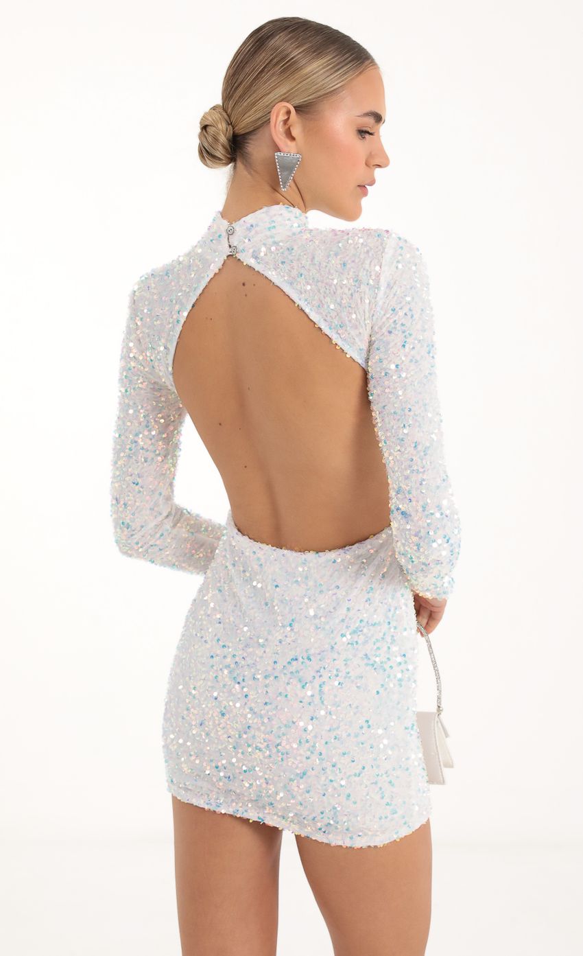 Picture Velvet Iridescent Sequin Open Back Dress in White. Source: https://media-img.lucyinthesky.com/data/Nov22/850xAUTO/33fde57d-b90e-4bcc-a413-247f1533dab0.jpg