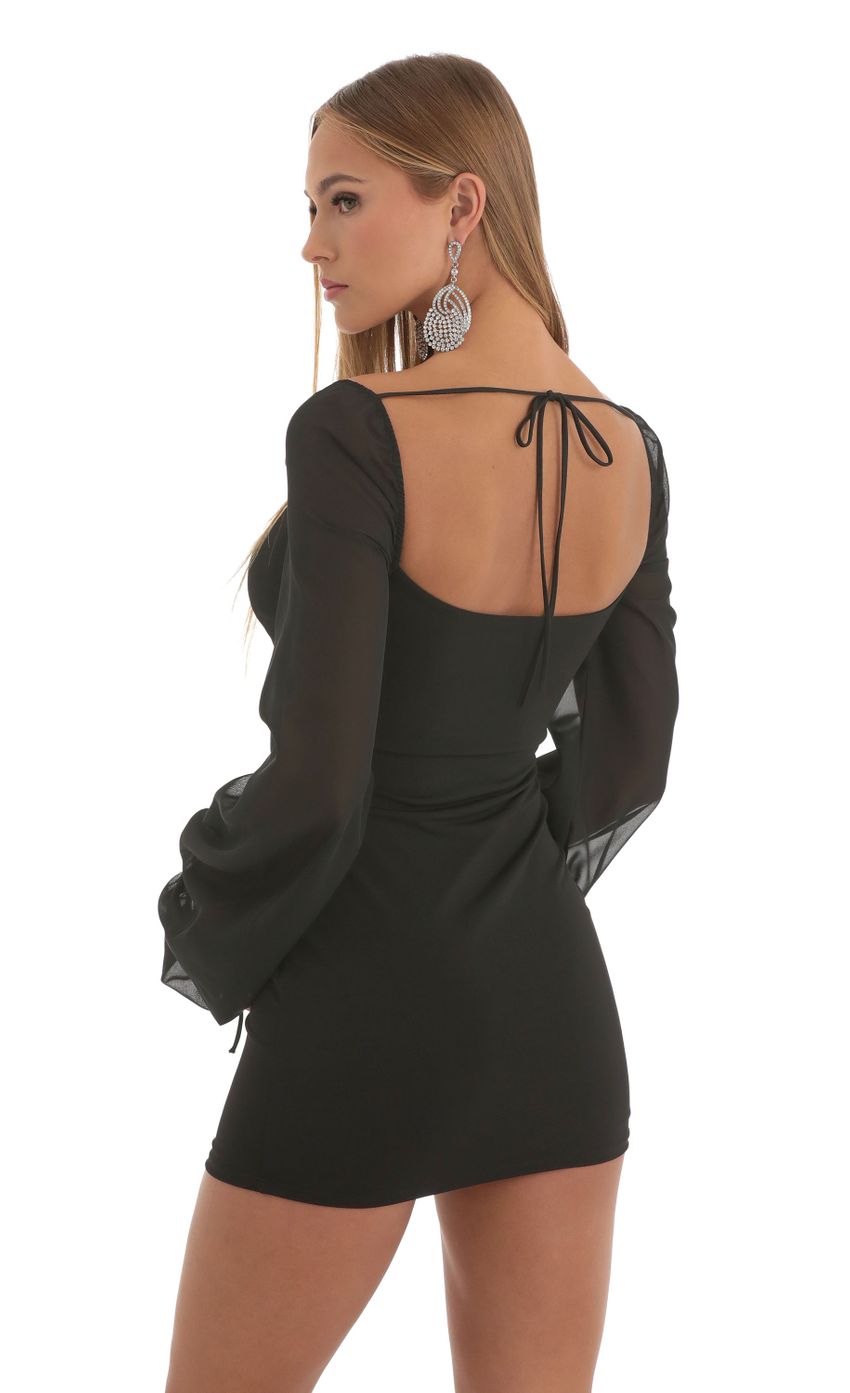 Picture Crinkle Chiffon Long Sleeve Dress in Black. Source: https://media-img.lucyinthesky.com/data/Nov22/850xAUTO/4c5e2ede-6bf7-4f3b-b179-65b92ba06966.jpg
