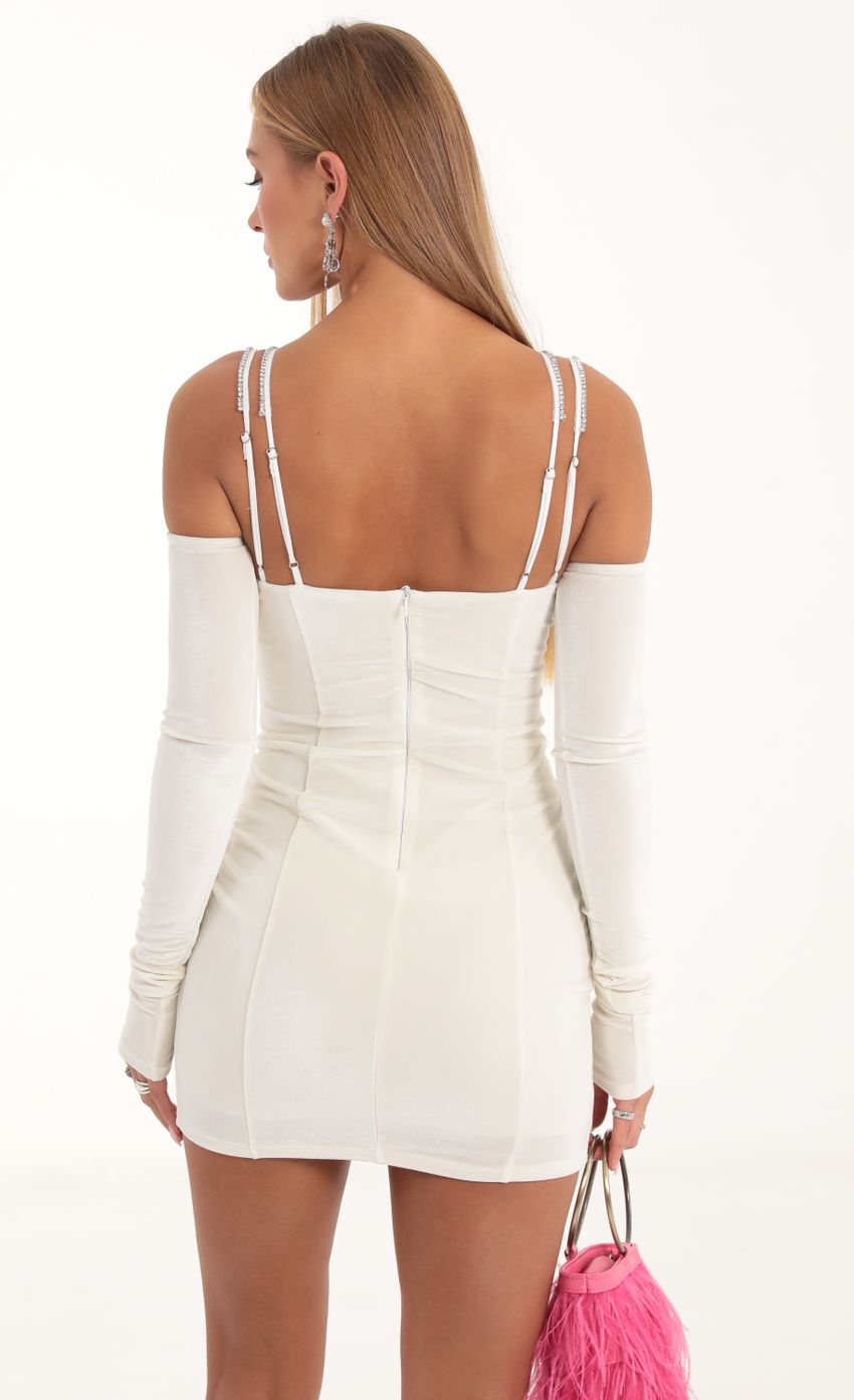 Picture Velvet Cutout Dress and Gloves in White. Source: https://media-img.lucyinthesky.com/data/Nov22/850xAUTO/5fc8c737-0e02-47dd-9560-641a6231ed8b.jpg