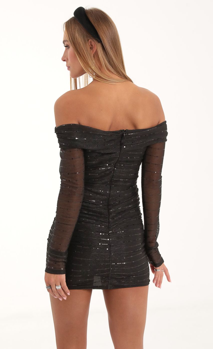 Picture Sequin Mesh Off The Shoulder Dress in Black. Source: https://media-img.lucyinthesky.com/data/Nov22/850xAUTO/6b24ce94-f467-4169-81de-7f61cc6789d4.jpg