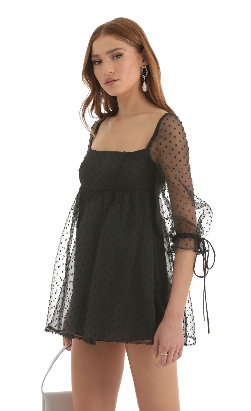 Picture Dotted Puff Sleeve Baby Doll Dress in Black. Source: https://media-img.lucyinthesky.com/data/Nov22/850xAUTO/74de483f-b494-48b4-a482-77a76daec413.jpg