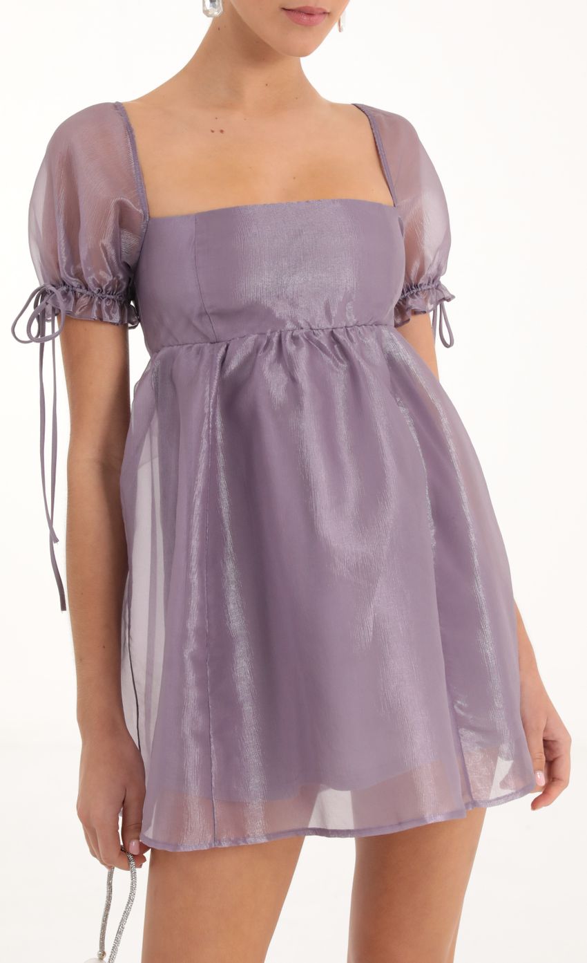 Picture Baby Doll Dress in Purple. Source: https://media-img.lucyinthesky.com/data/Nov22/850xAUTO/96443f7a-bade-4131-abb8-a92736edea2d.jpg
