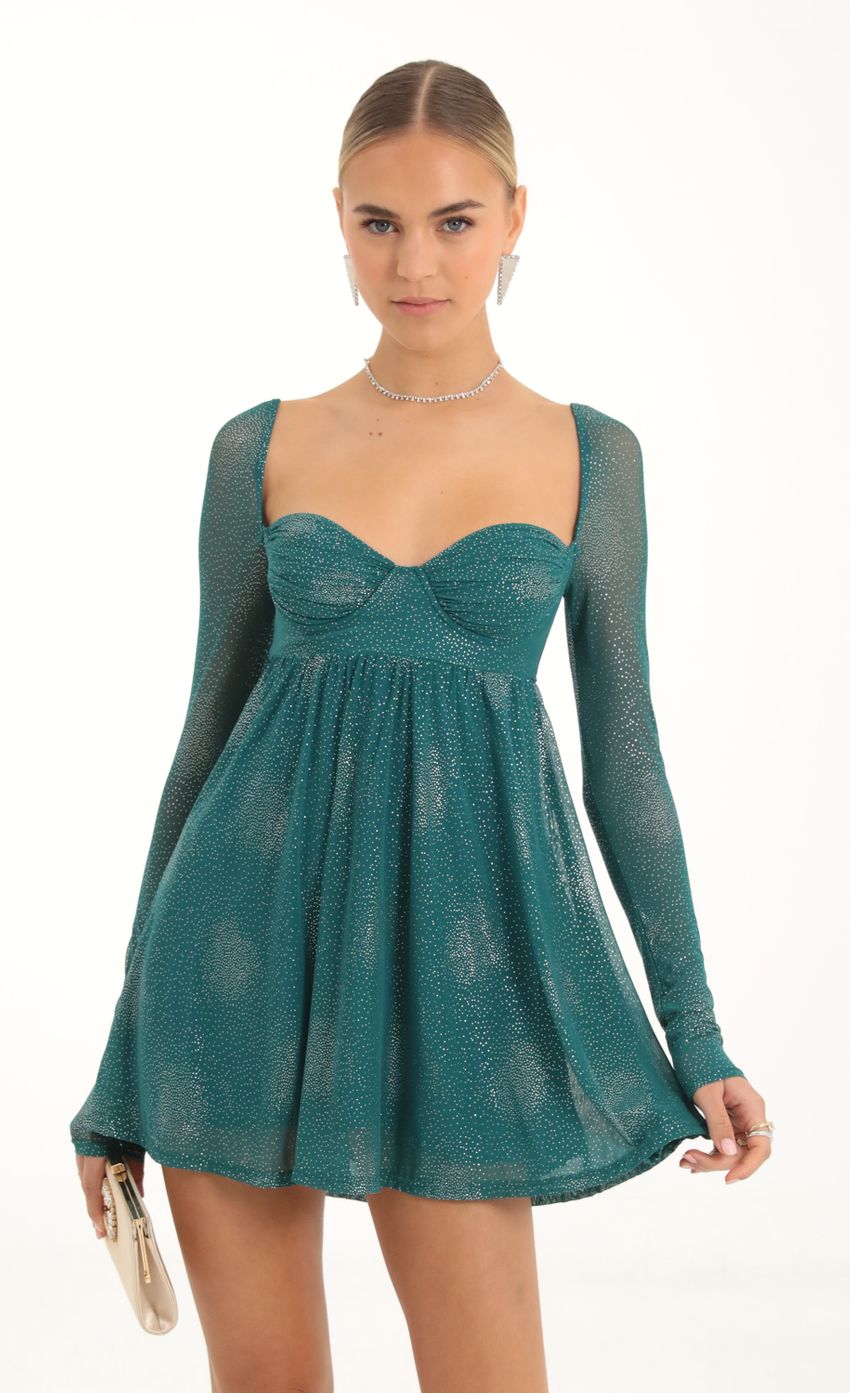 Picture Glitter Mesh Baby Doll Dress in Teal. Source: https://media-img.lucyinthesky.com/data/Nov22/850xAUTO/b66c26ea-9a95-4abf-8321-b72444cb4a49.jpg