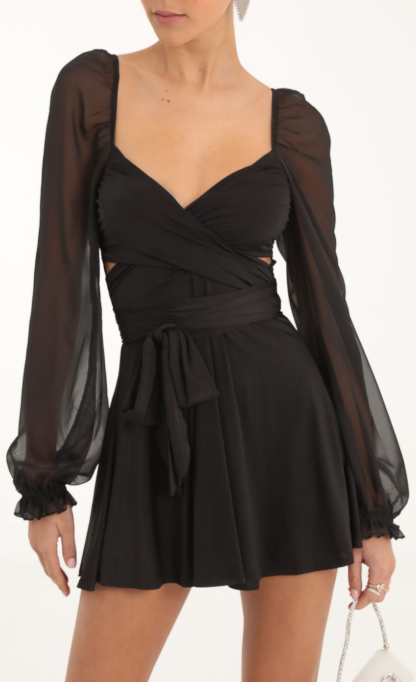 Picture Puff Chiffon Wrap Dress in Black. Source: https://media-img.lucyinthesky.com/data/Nov22/850xAUTO/c8d39f62-0265-4515-a31c-fc9329ed49ba.jpg