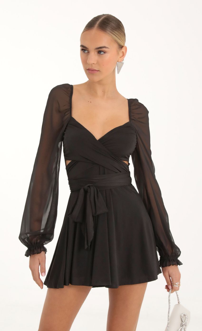 Picture Puff Chiffon Wrap Dress in Black. Source: https://media-img.lucyinthesky.com/data/Nov22_1/850xAUTO/1V9A2239.JPG
